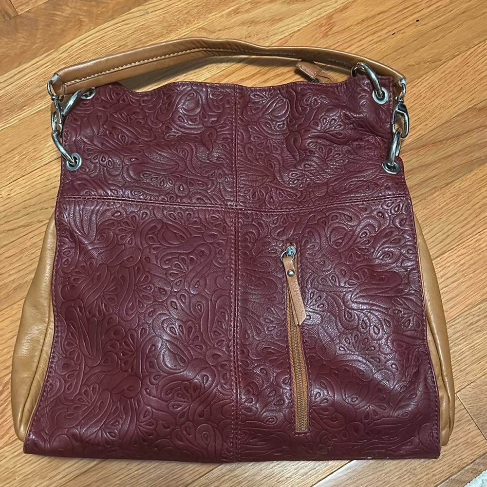 Lavorazione artigiana soft leather maroon and brown purse bag